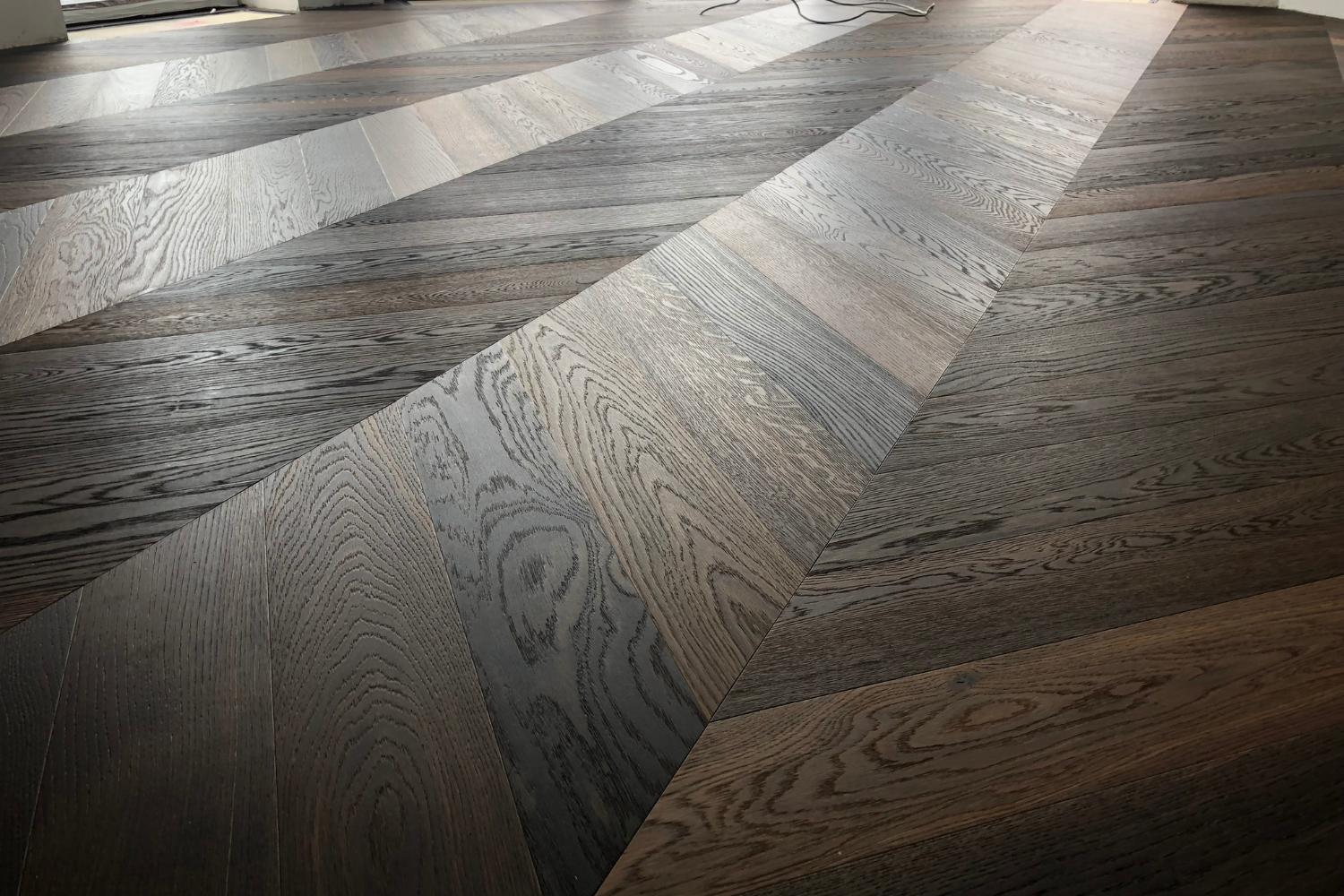 Scheucher Parkett Multiflor.11 Französisch Fischgrät 45°  Eiche Kern geräuchert 